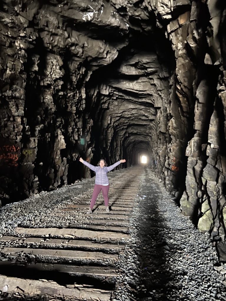 Feeling Good Natured Hiker inside a rocky cavern in Northern Ontario