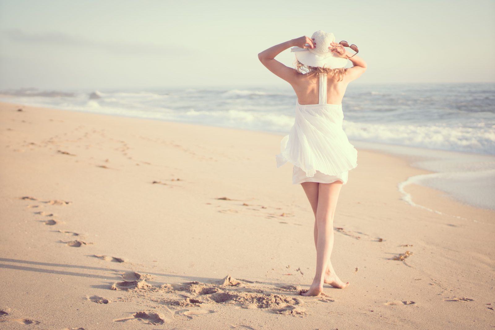 Woman on Beach - Five Summer Must Haves