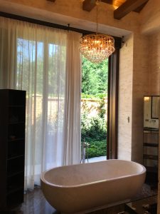 modern bathroom with chandelier