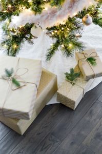 Christmas gifts under a tree