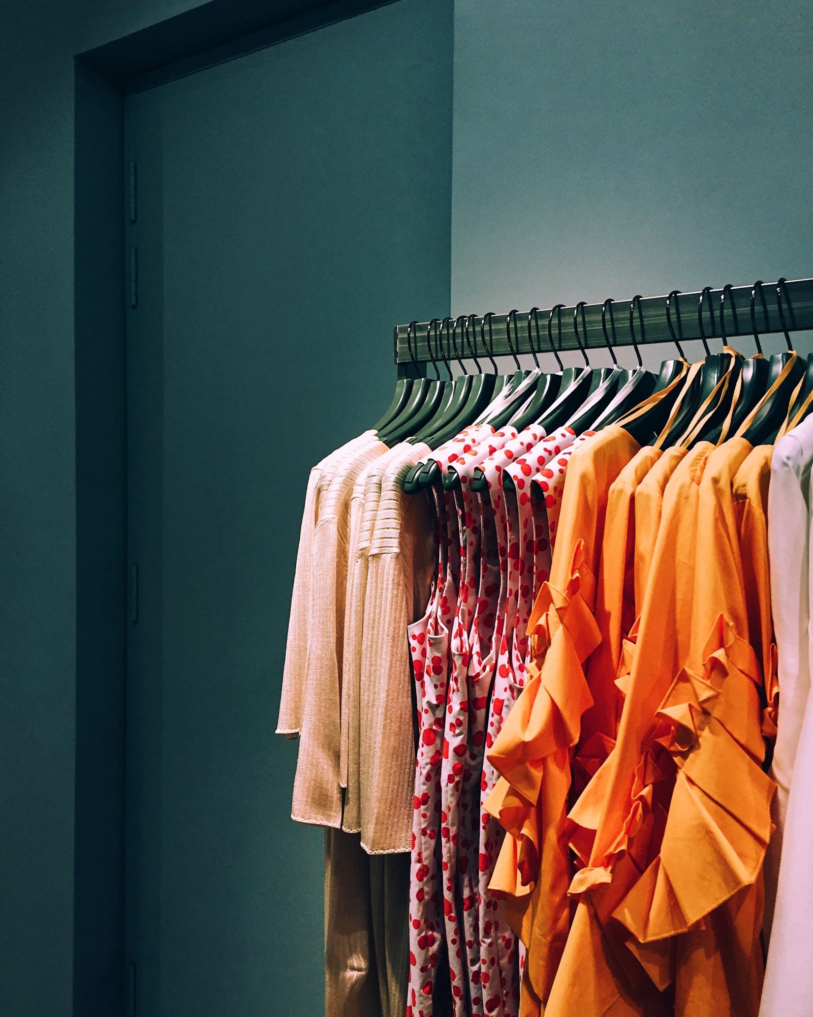 Clothing hanging on a retail display rack